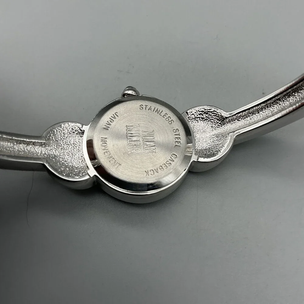 Nolan Miller Womens Watch 21mm Silver Tone MOP Dial Bangle Crystals 7